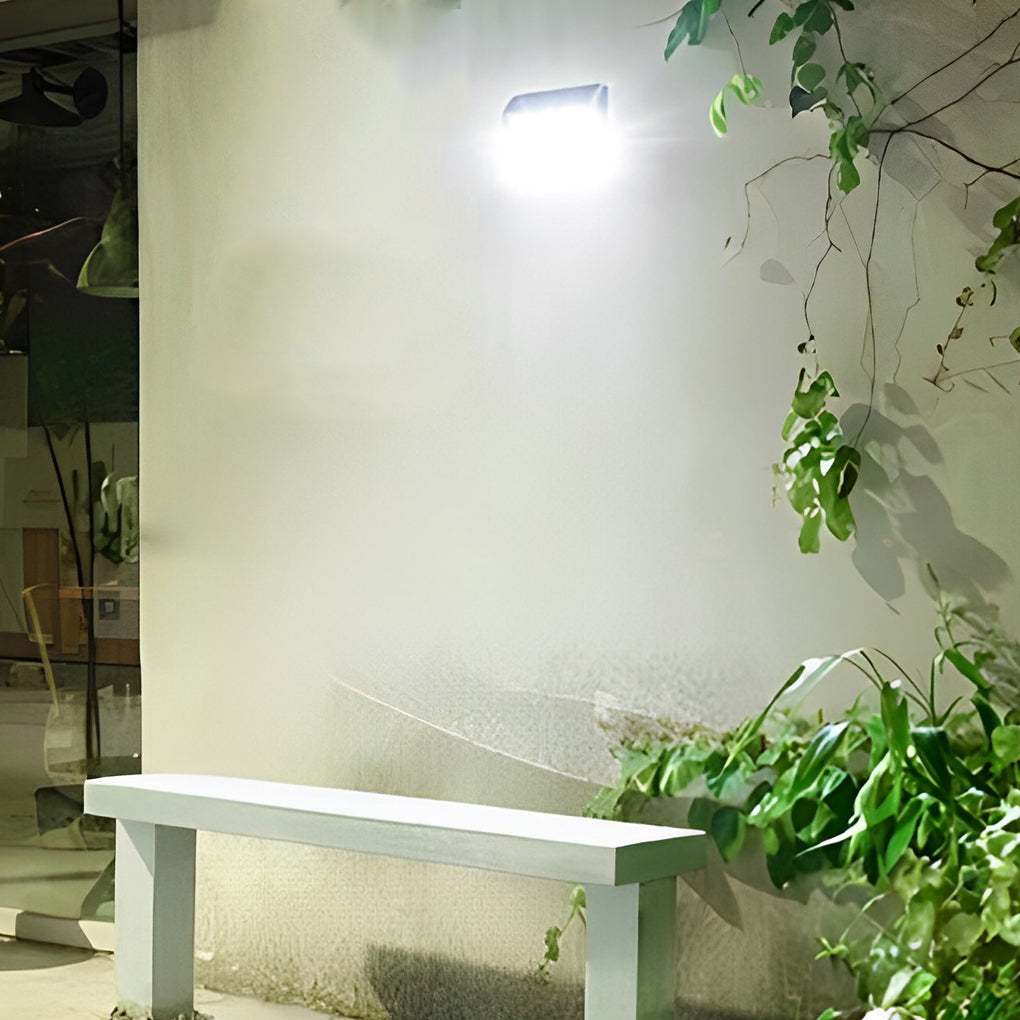 Outdoor solar wall light with motion sensor providing soft light near a staircase.