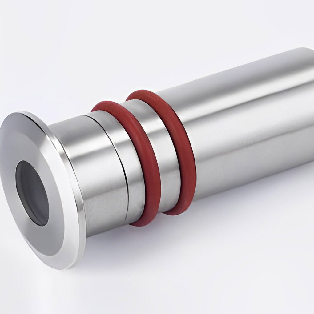 Close-up of an outdoor step light fixture, showcasing its stainless steel and durable design.