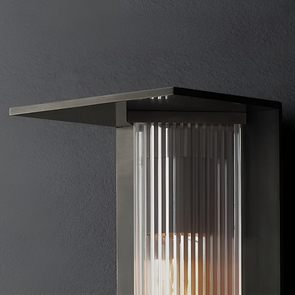Outdoor vertical wall sconce with side view showing depth and light diffusion.