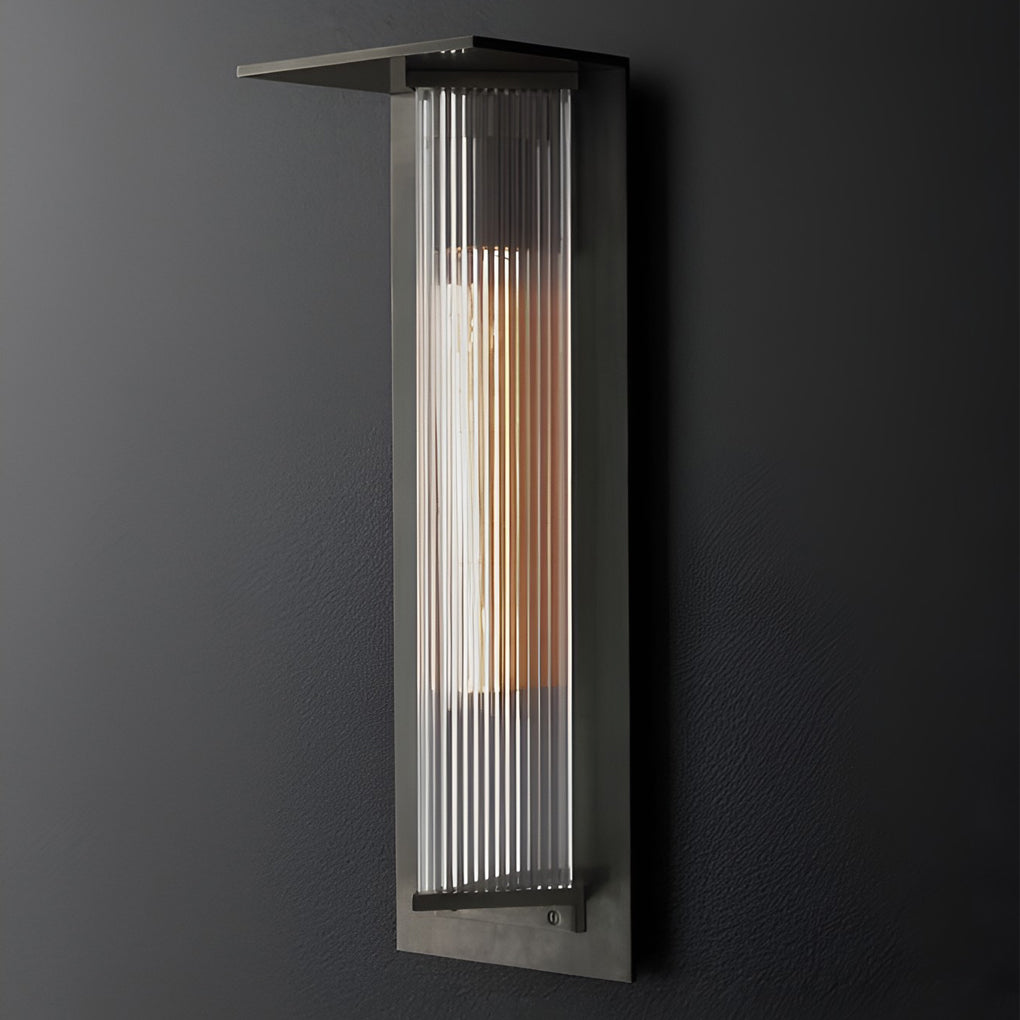 Outdoor vertical wall sconce enhancing a stylish outdoor entrance with ambient light.