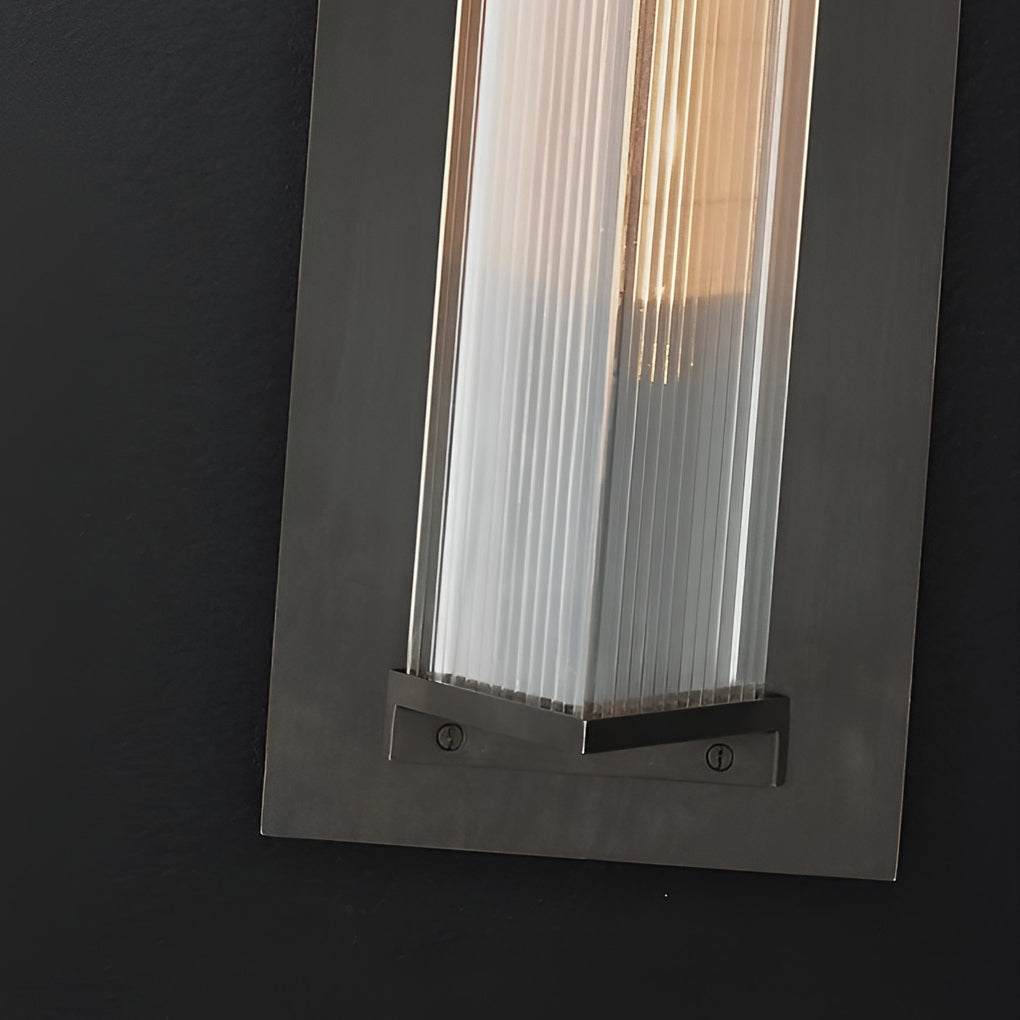 Outdoor vertical wall sconce with top view highlighting unique vertical design.