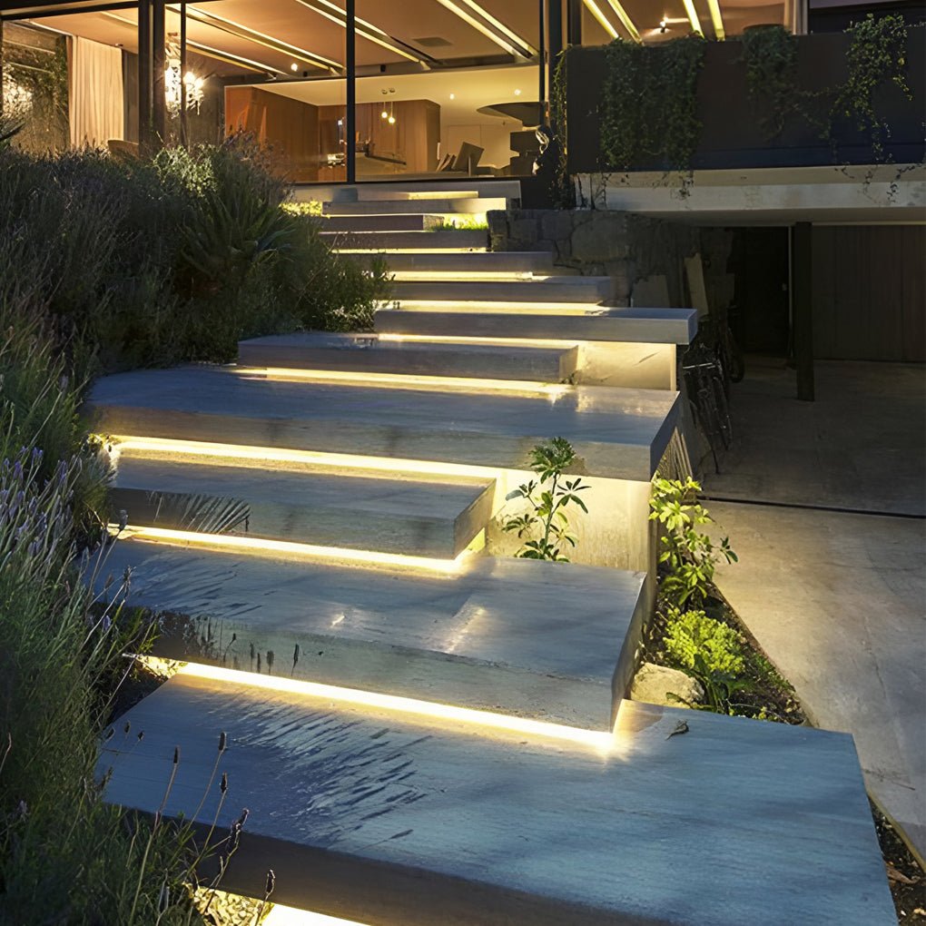 Waterproof outdoor LED strip lights installed along exterior stairs