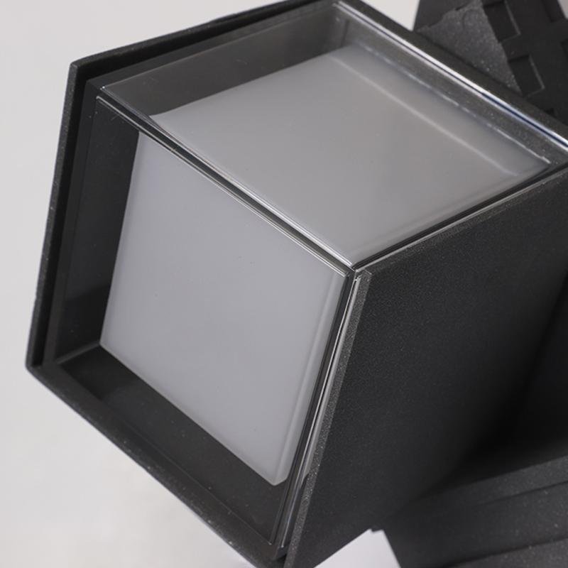 Outside up down wall lights with a black finish, enhancing a contemporary outdoor space.