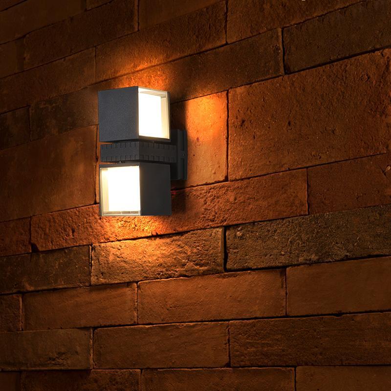 Outside up down wall lights with a geometric design, providing soft illumination.