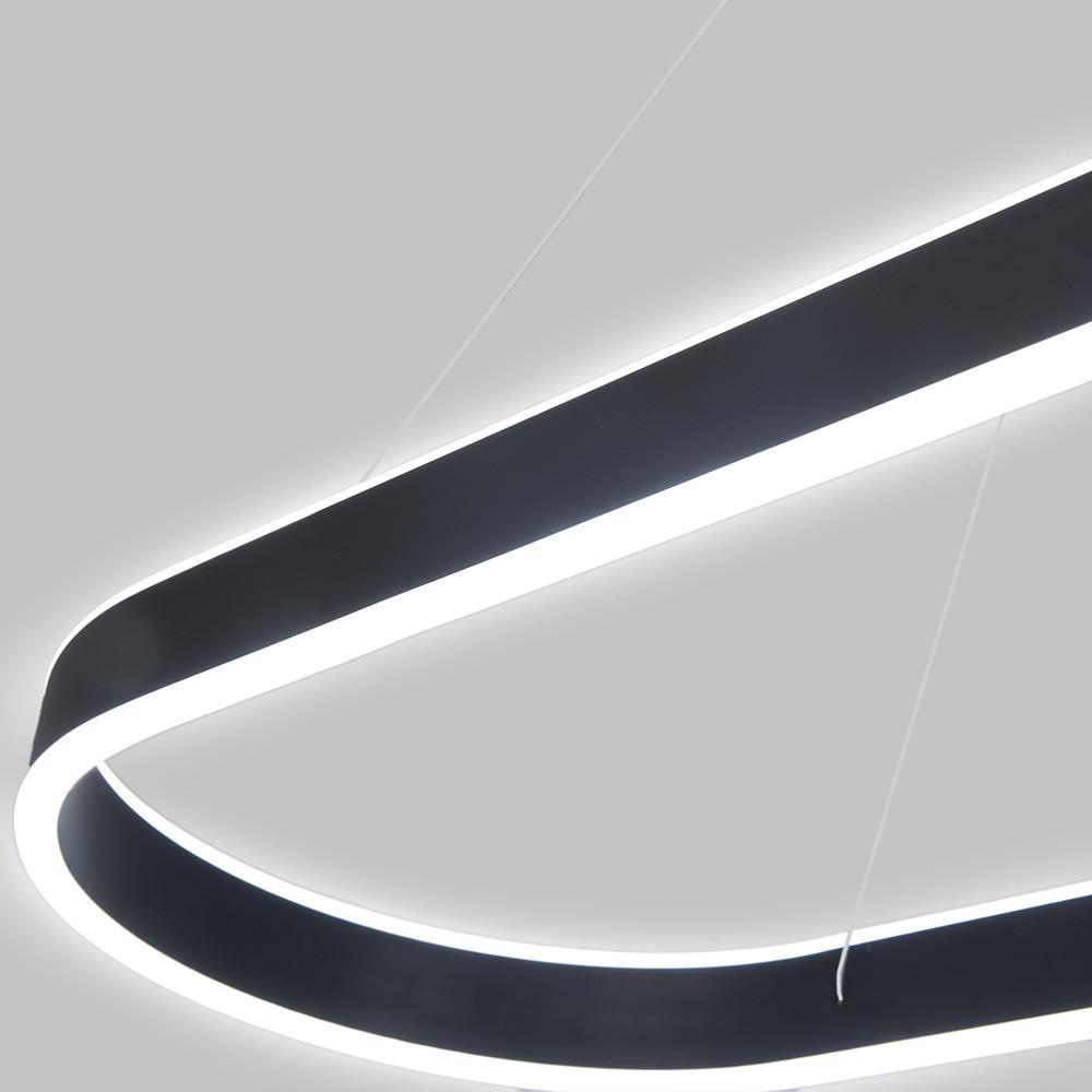 Close-up view of oval LED pendant light showing smooth curved frame and diffused light.