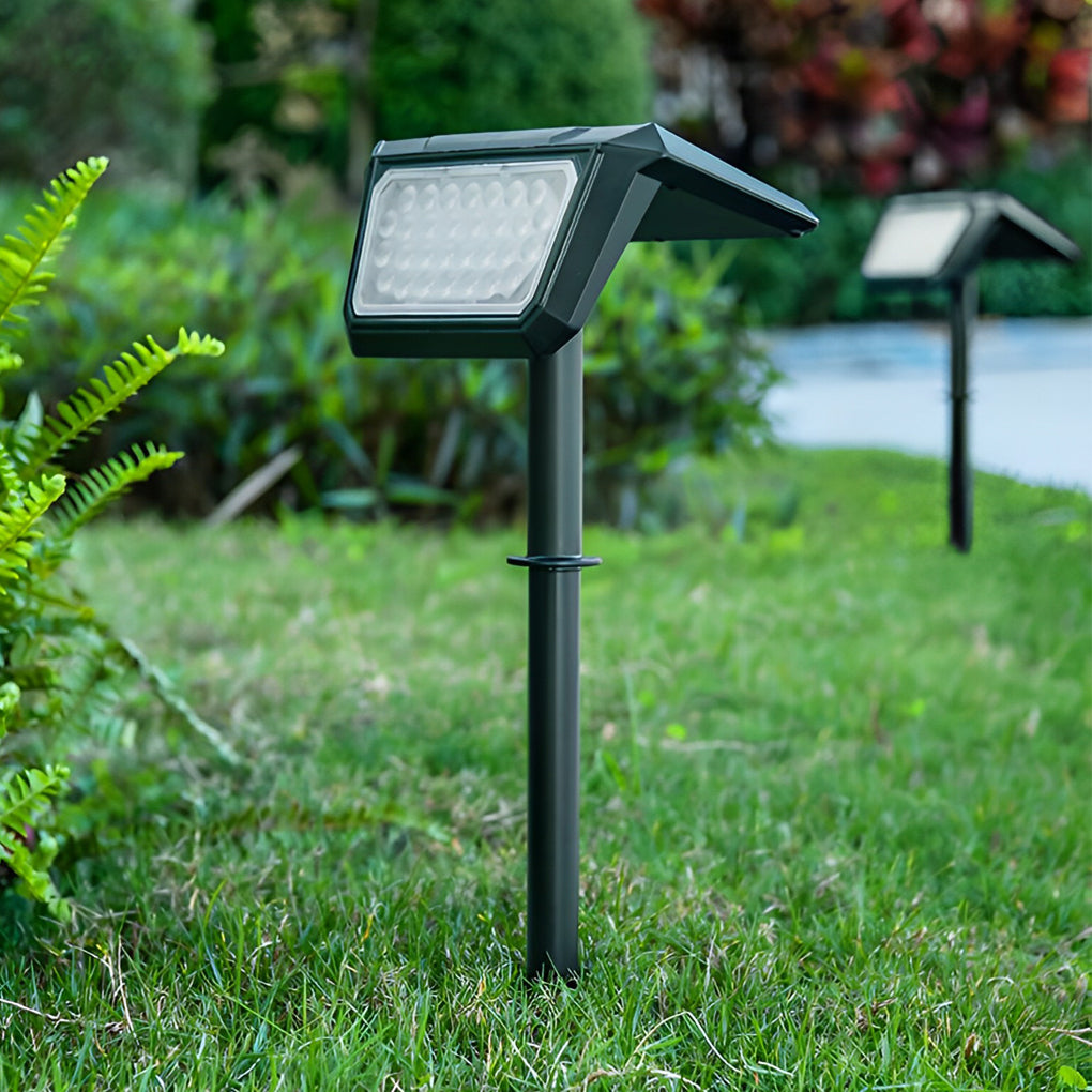 Pair of solar path lights outdoor mounted on a lawn, providing symmetrical illumination for pathways.