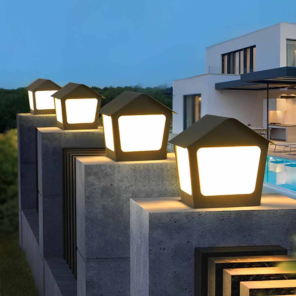 Patio pillar lights providing elegant illumination for a contemporary landscape.