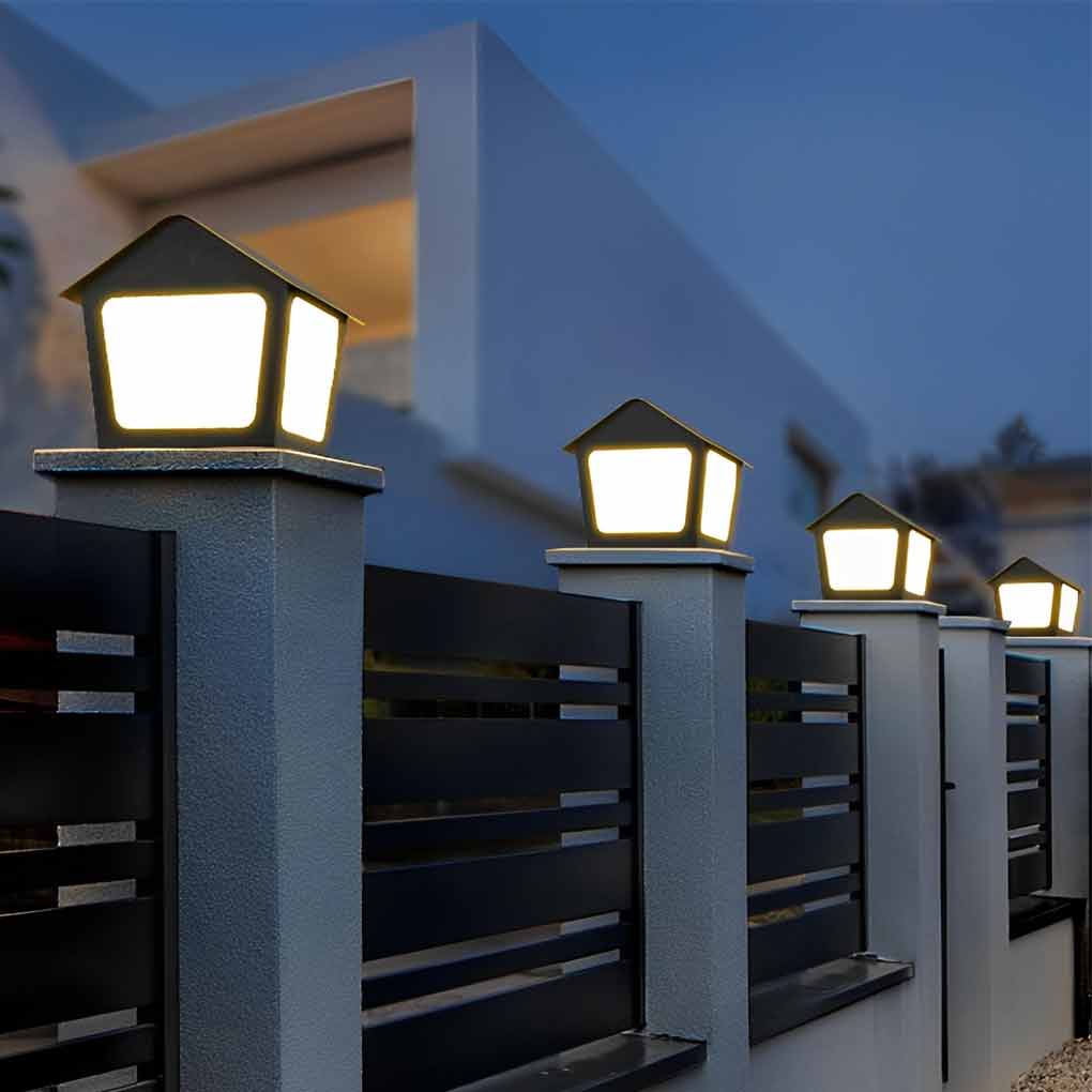 Patio pillar lights illuminating a cozy outdoor deck with directional glow.