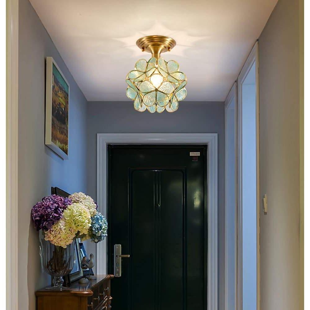 Petal shaped ceiling lights in gold, front view of the elegant design.