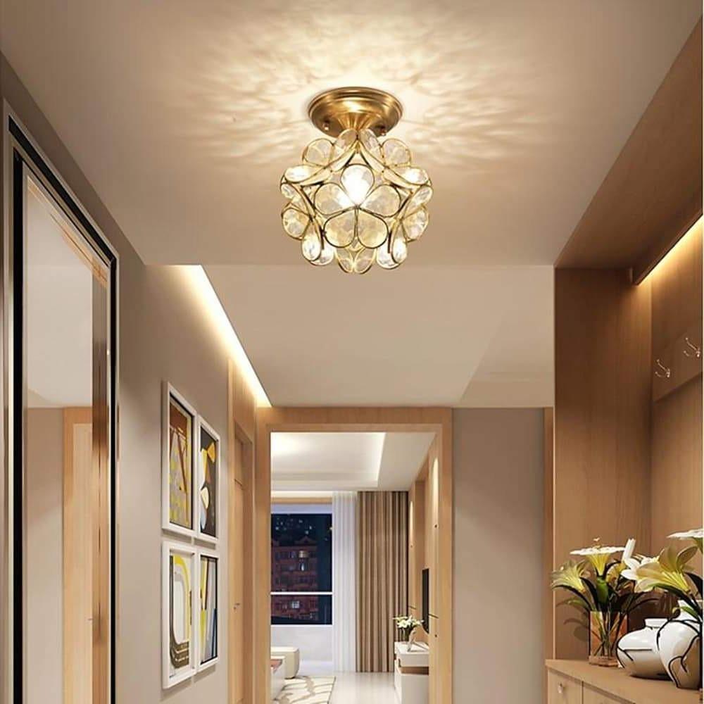 Petal shaped ceiling lights in gold, side view of the floral design.