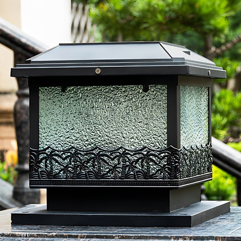 Pillar solar lights for outdoors shown in a close-up outdoor setting, highlighting frosted glass texture and black housing.