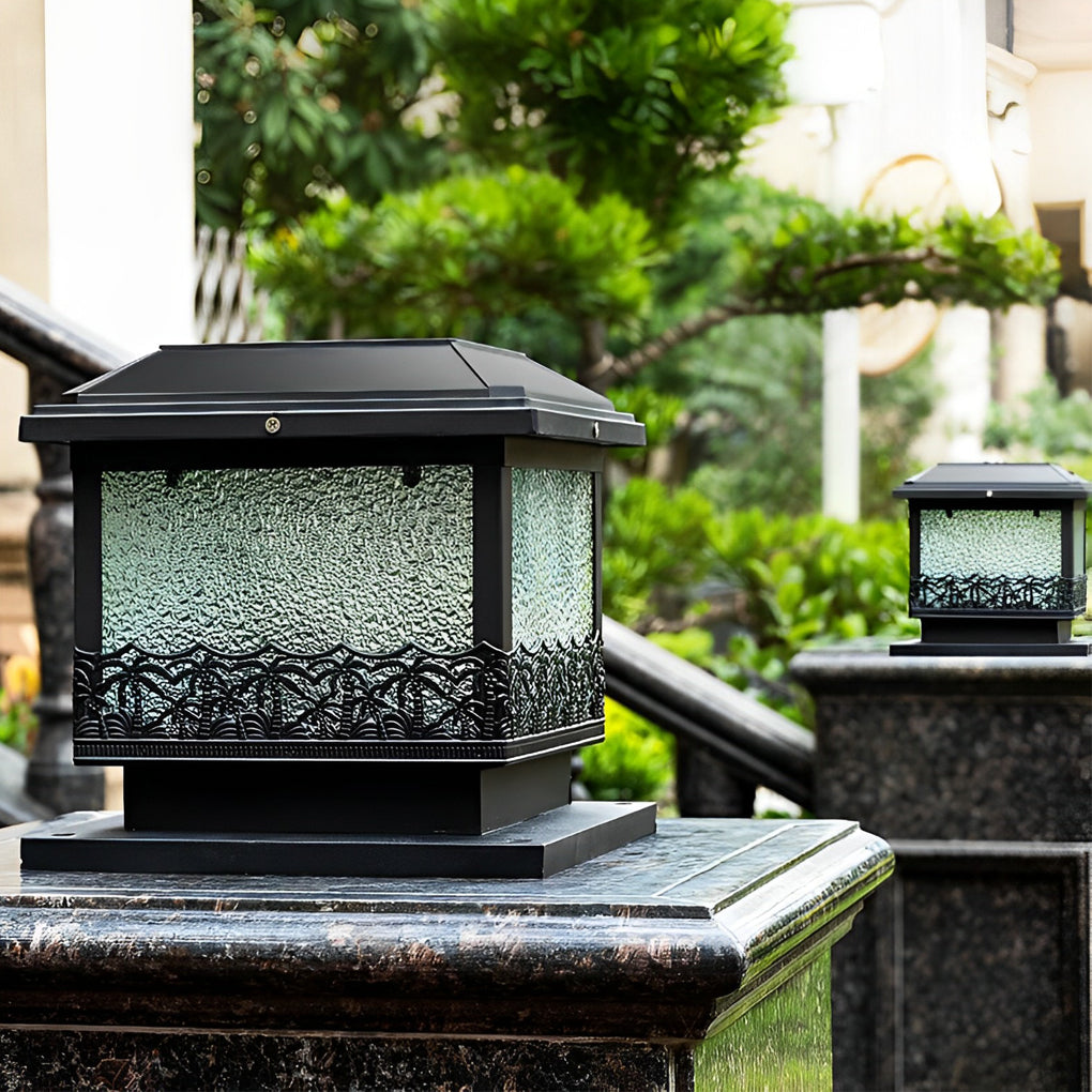 Pillar solar lights for outdoors on stone pillars near a patio, combining textured glass panels with classic design.