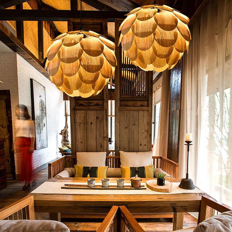 Close-up of pinecone pendant light showcasing its layered and natural wood design.