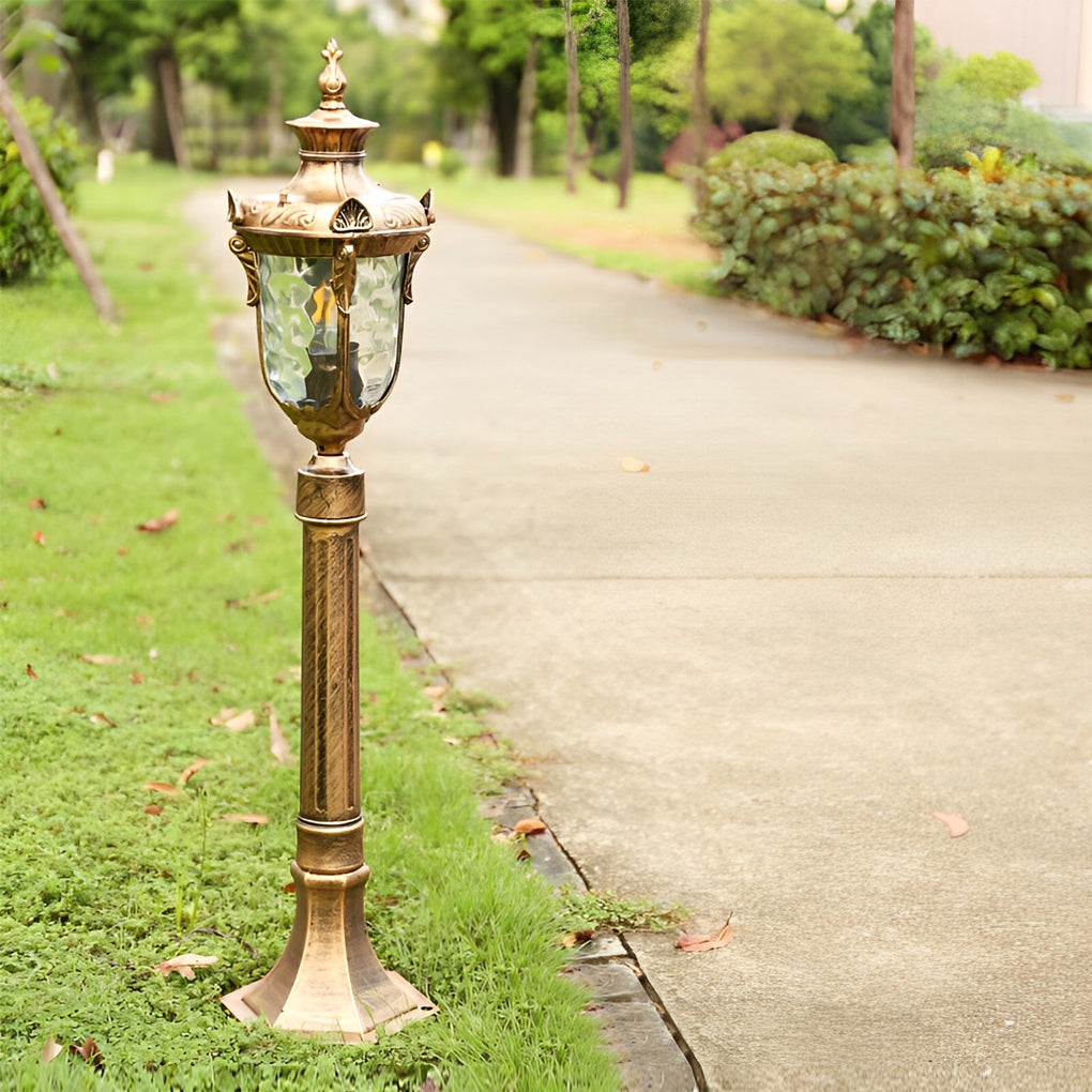 Poles for yard lights with a close-up of the illuminated glass panels.