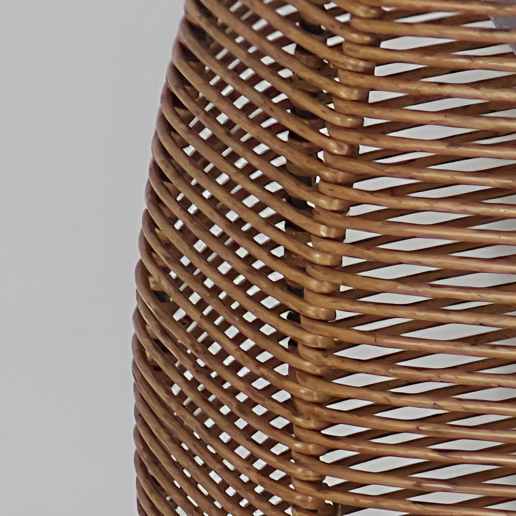 Rattan floor lantern with close-up of the woven texture and base.