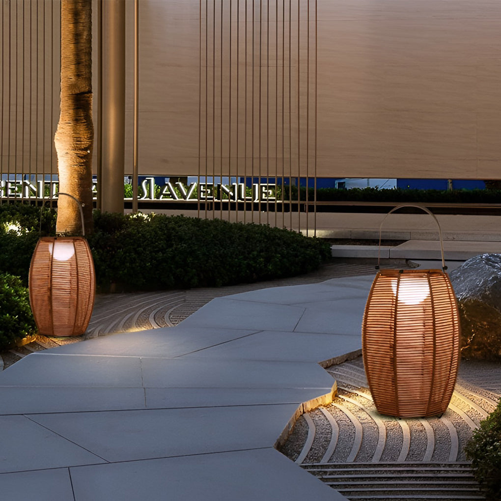 Rattan floor lantern illuminating a serene poolside area with directional glow.