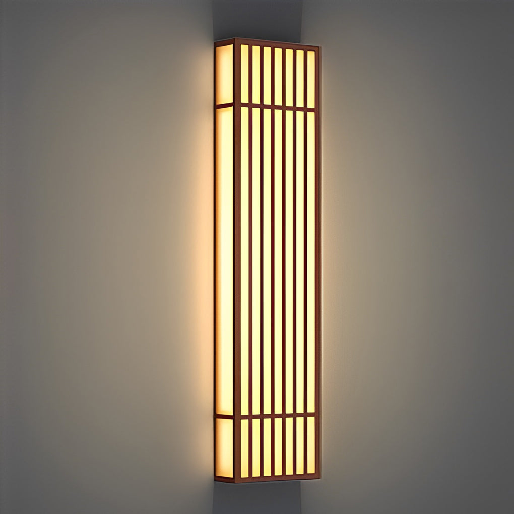 Single rectangle LED outdoor wall light shown turned on against wall