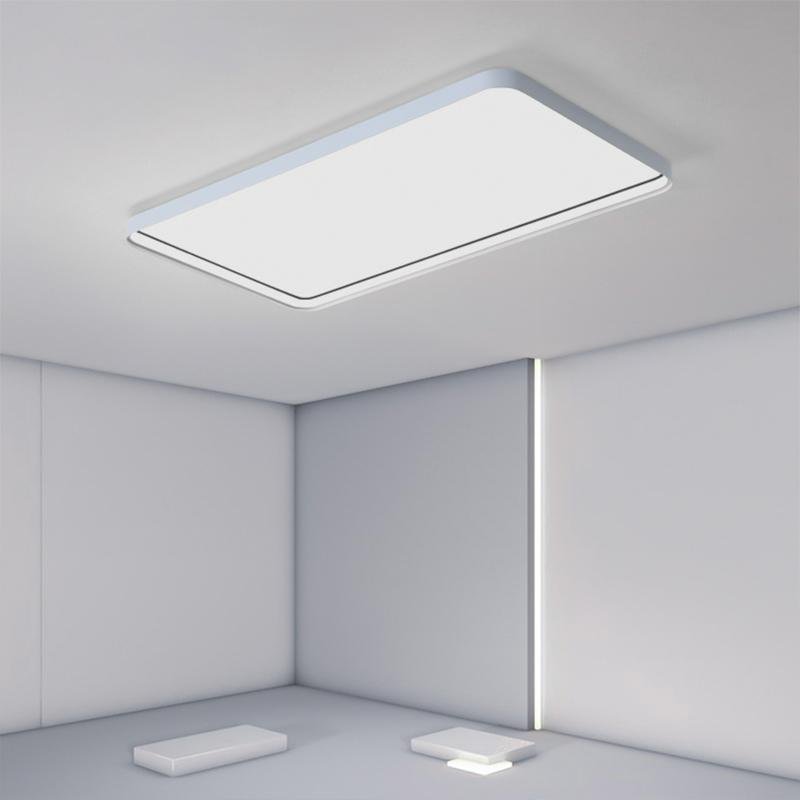 Rectangular flush mount ceiling light with a minimalist design, providing soft light.
