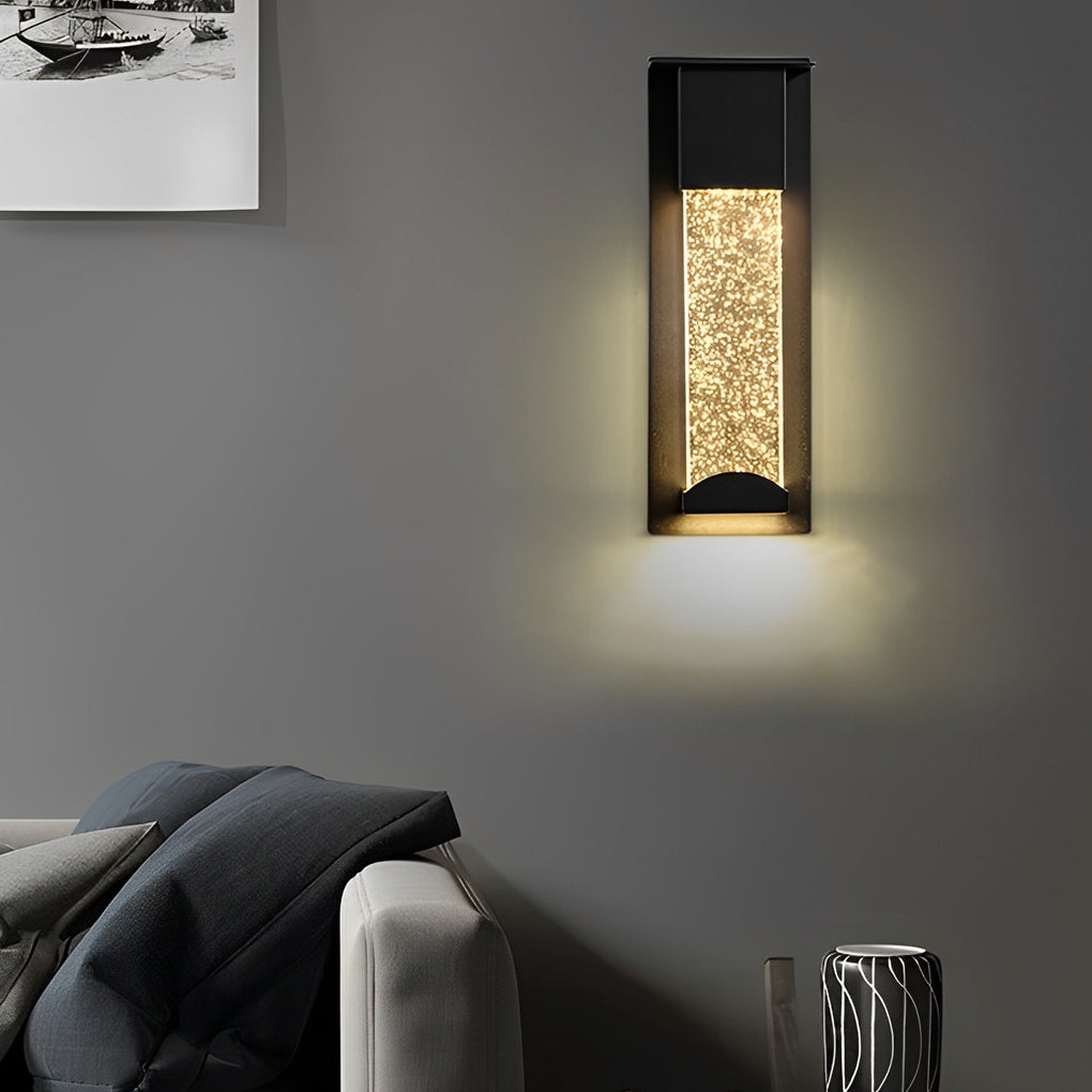Black rectangular outdoor wall lights used as accent lighting in modern living space setting.