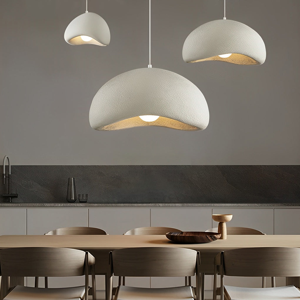 Close-up of a resin pendant light showcasing its textured surface and soft, ambient lighting.