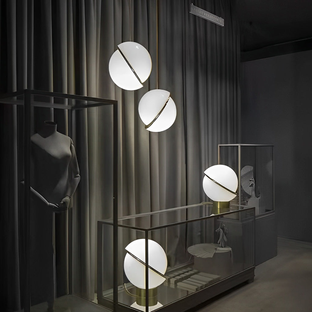 Chic White Spherical Pendant Light set illuminating a stylish retail showroom or boutique.