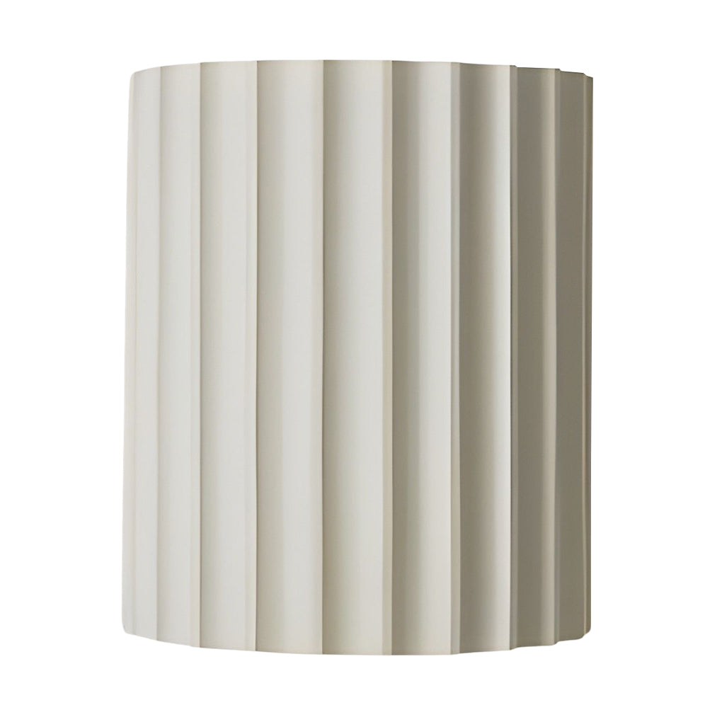 Ribbed wall sconces with close-up of the ribbed texture and finish.