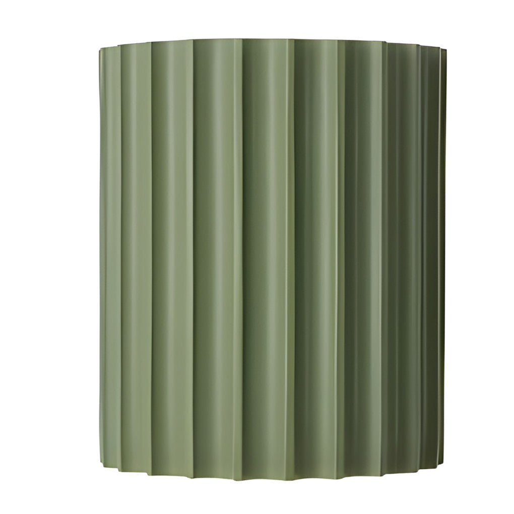 Ribbed wall sconces in various colors for versatile interior lighting.