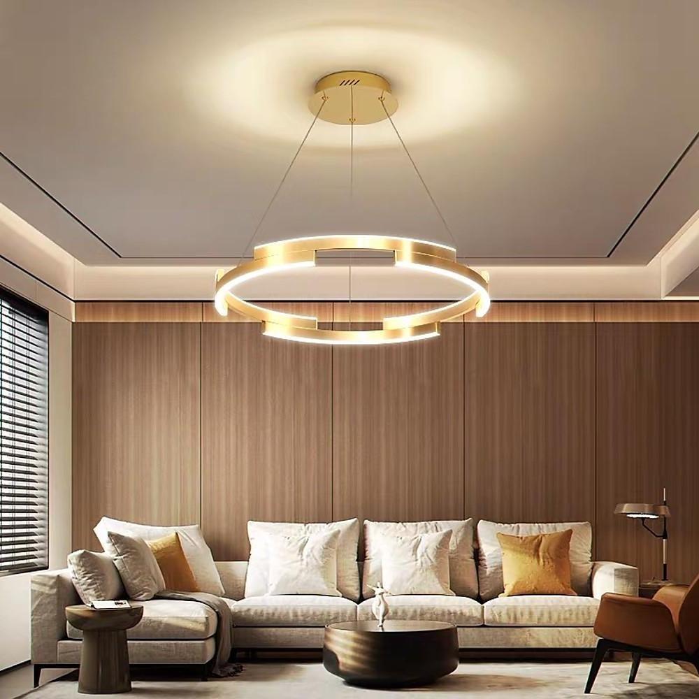 Ring chandelier brass enhancing a stylish living area with sleek, geometric design.