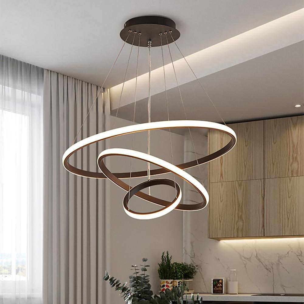 Minimalist ring LED chandelier above dining table.