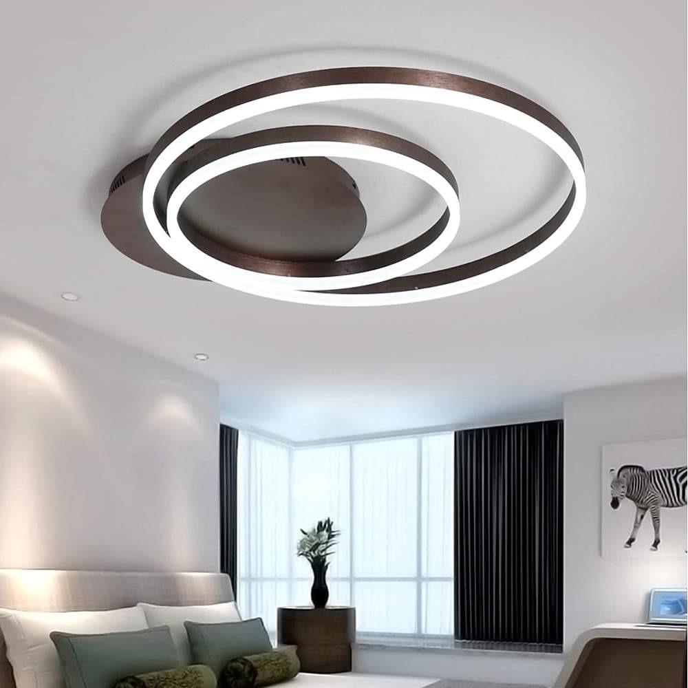 Ring pendant light fixture casting a gentle glow in a chic living room.