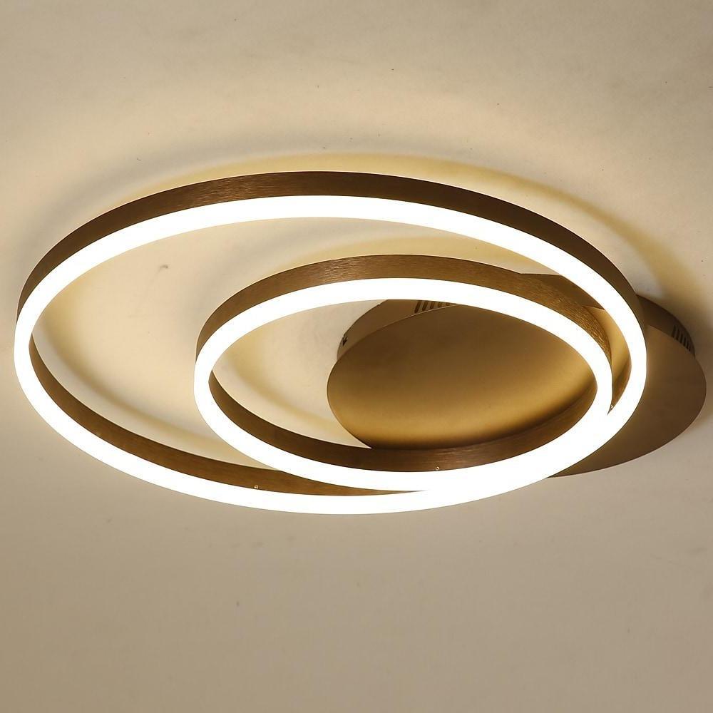 Ring pendant light fixture in gold, front view of the modern design.