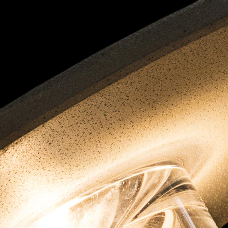 Round exterior wall lights with a black finish, enhancing a contemporary outdoor space.