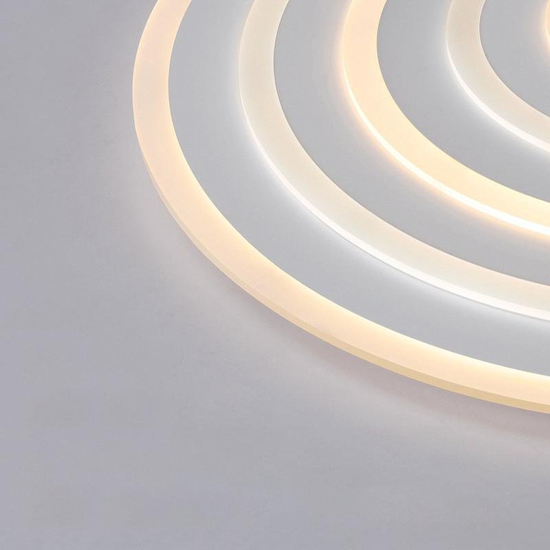 Close-up of round flush mount ceiling light showcasing its layered and modern design.