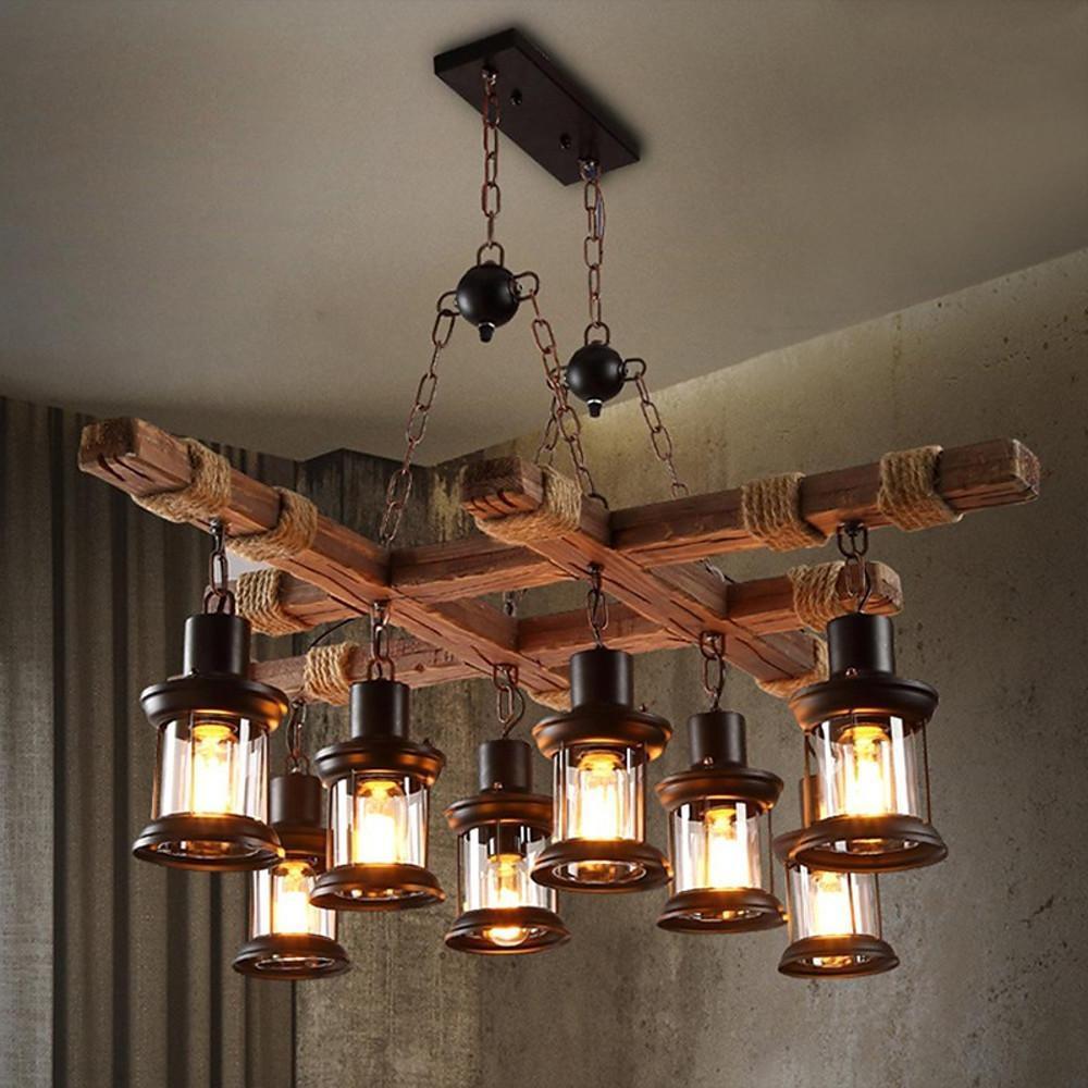 Rustic wood chandelier ceiling mount with black metal canopy and chains.