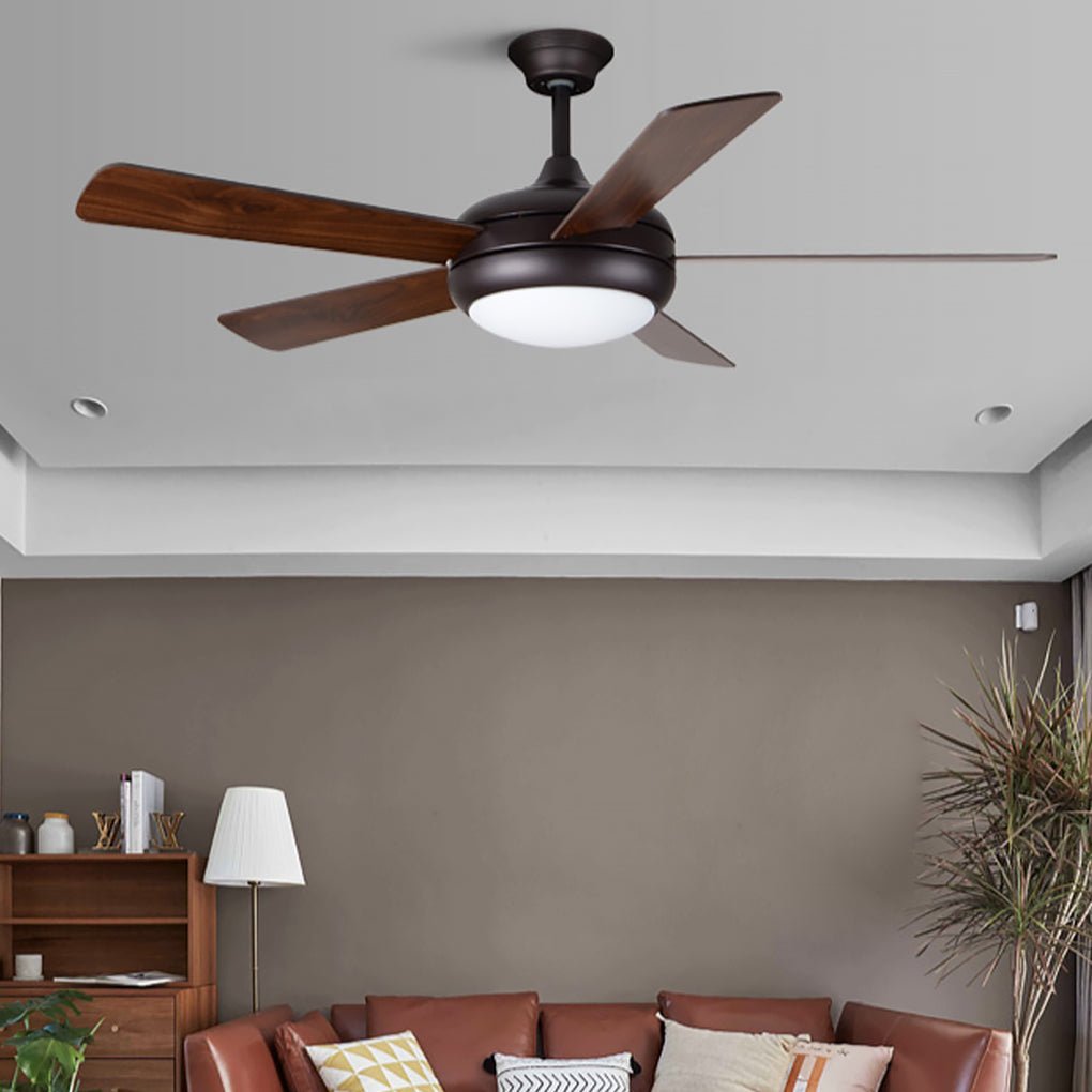 Semi-flush mount ceiling fan with light enhancing a contemporary living room.
