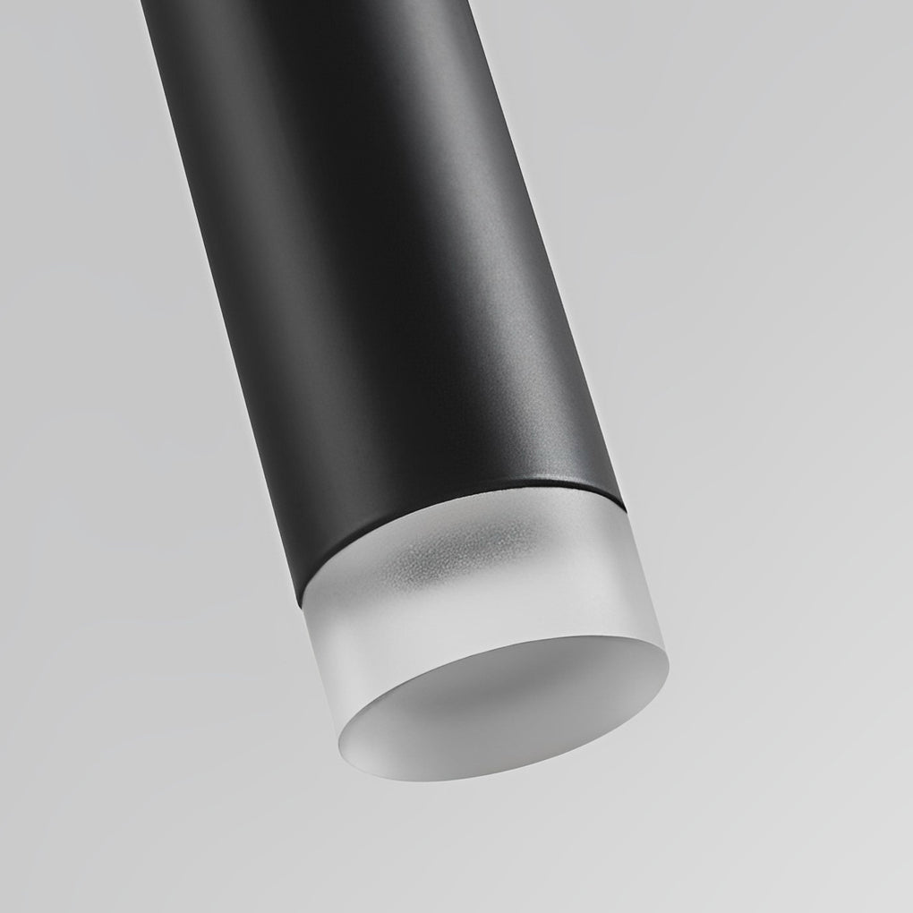 Close-up of the frosted diffuser tip of a Slim Black Pendant Light with matte black body.