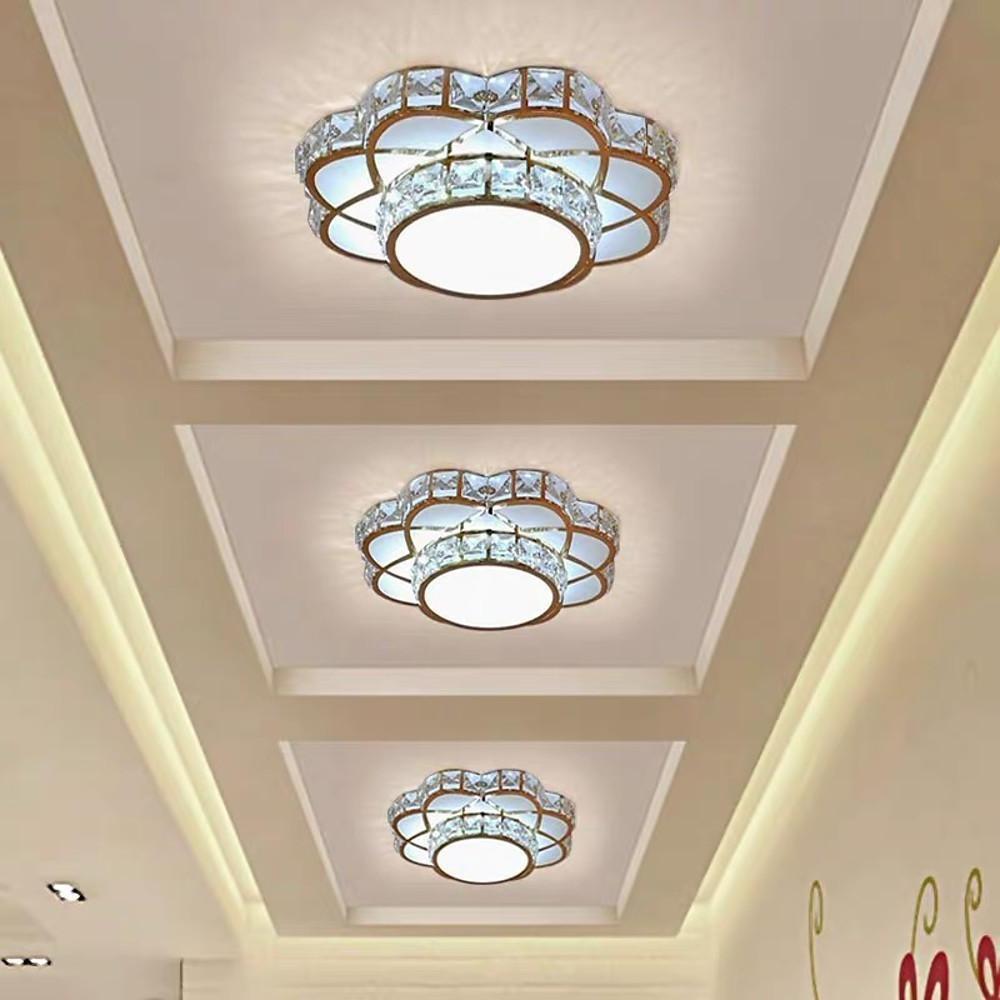 Small crystal flush mount ceiling light mounted in a recessed ceiling design.