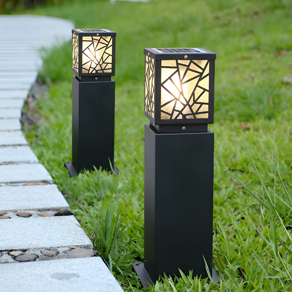 Solar bollard path lights providing elegant illumination for a contemporary landscape.