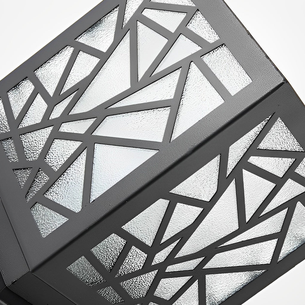Solar bollard path lights with close-up of its geometric pattern design and light output.