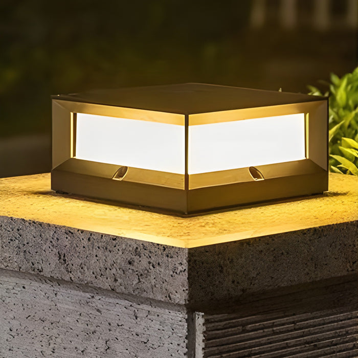 Solar garden pillar lights with modern black frame mounted on stone pillar, emitting warm light.