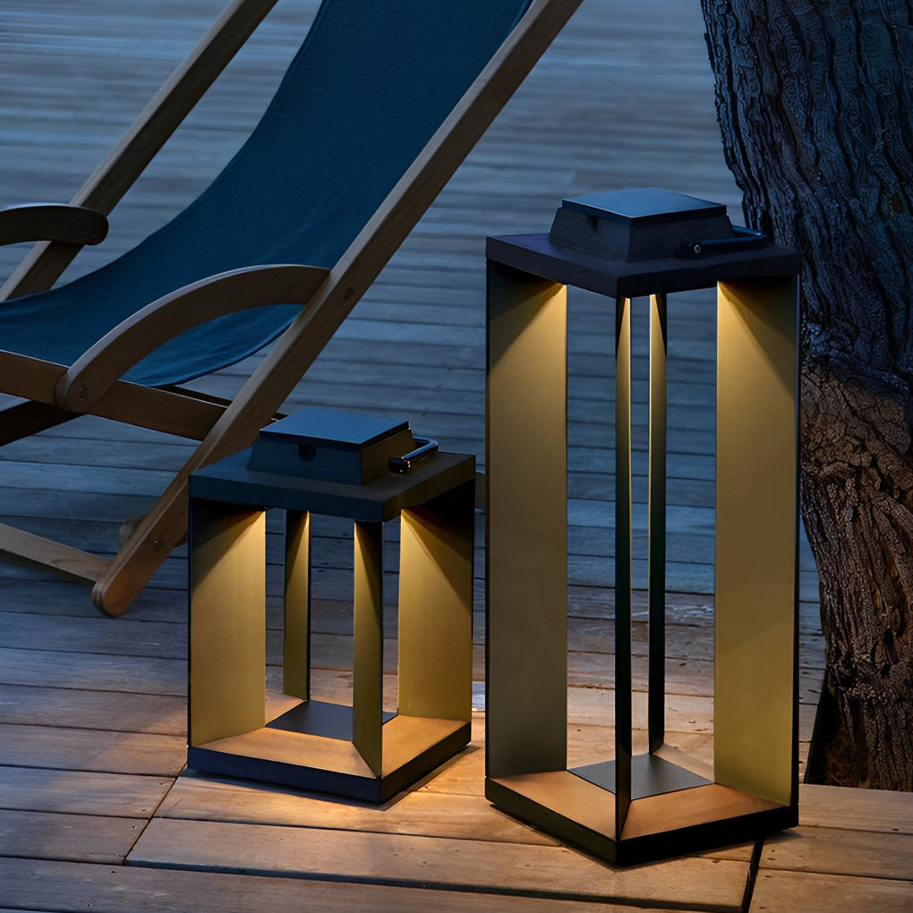 Set of portable solar lanterns arranged on a wooden deck near outdoor lounge chairs.