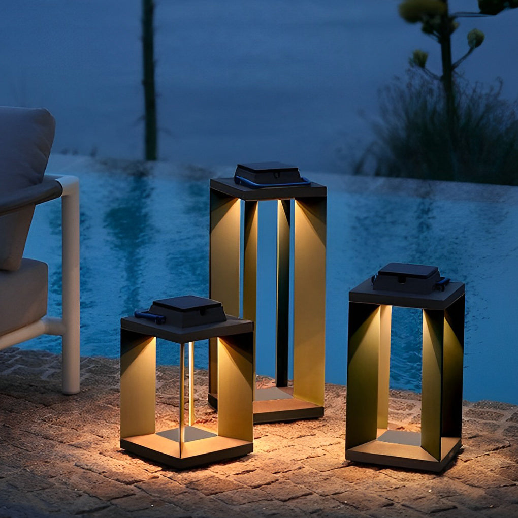 Solar lanterns lined along a low wall, adding decorative outdoor lighting after sunset.