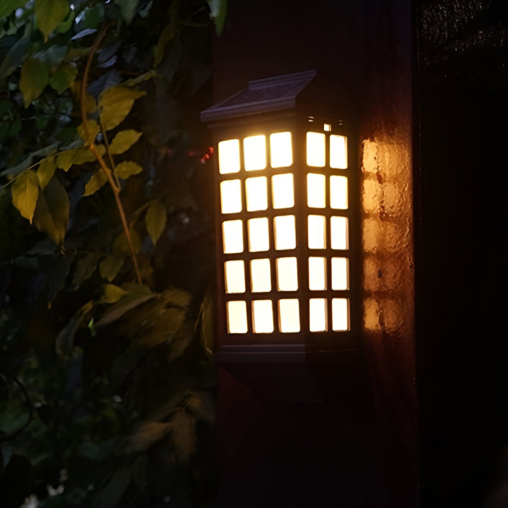 Solar light outdoor wall illuminating garden foliage, adding warm ambient lighting to an outdoor landscape.
