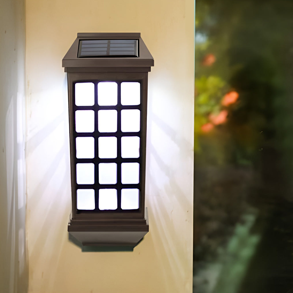 Solar light outdoor wall mounted on a flat exterior wall, showing symmetrical light projection pattern.