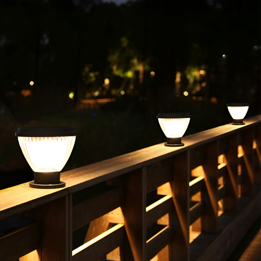 Solar light post cap with close-up of its sleek design and light output.