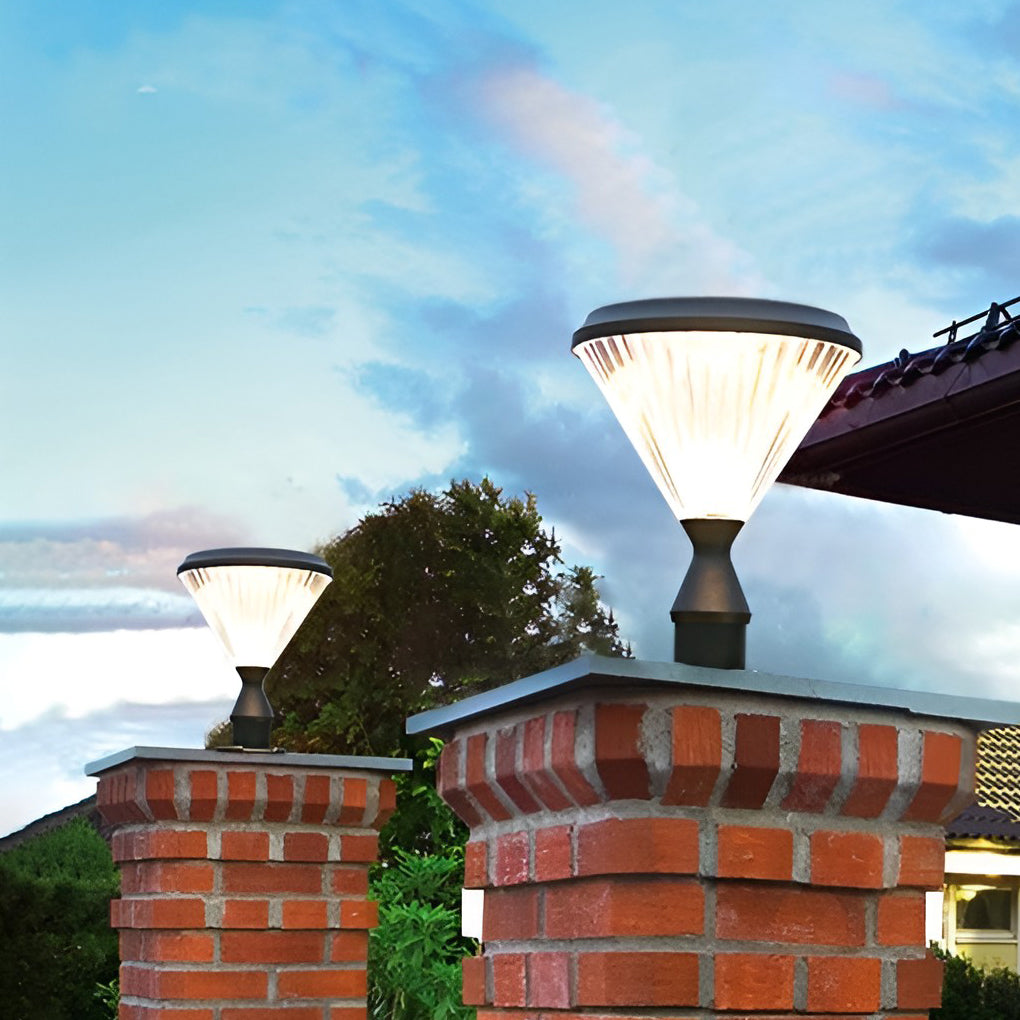 Solar light post cap illuminating a minimalist outdoor staircase with focused glow.