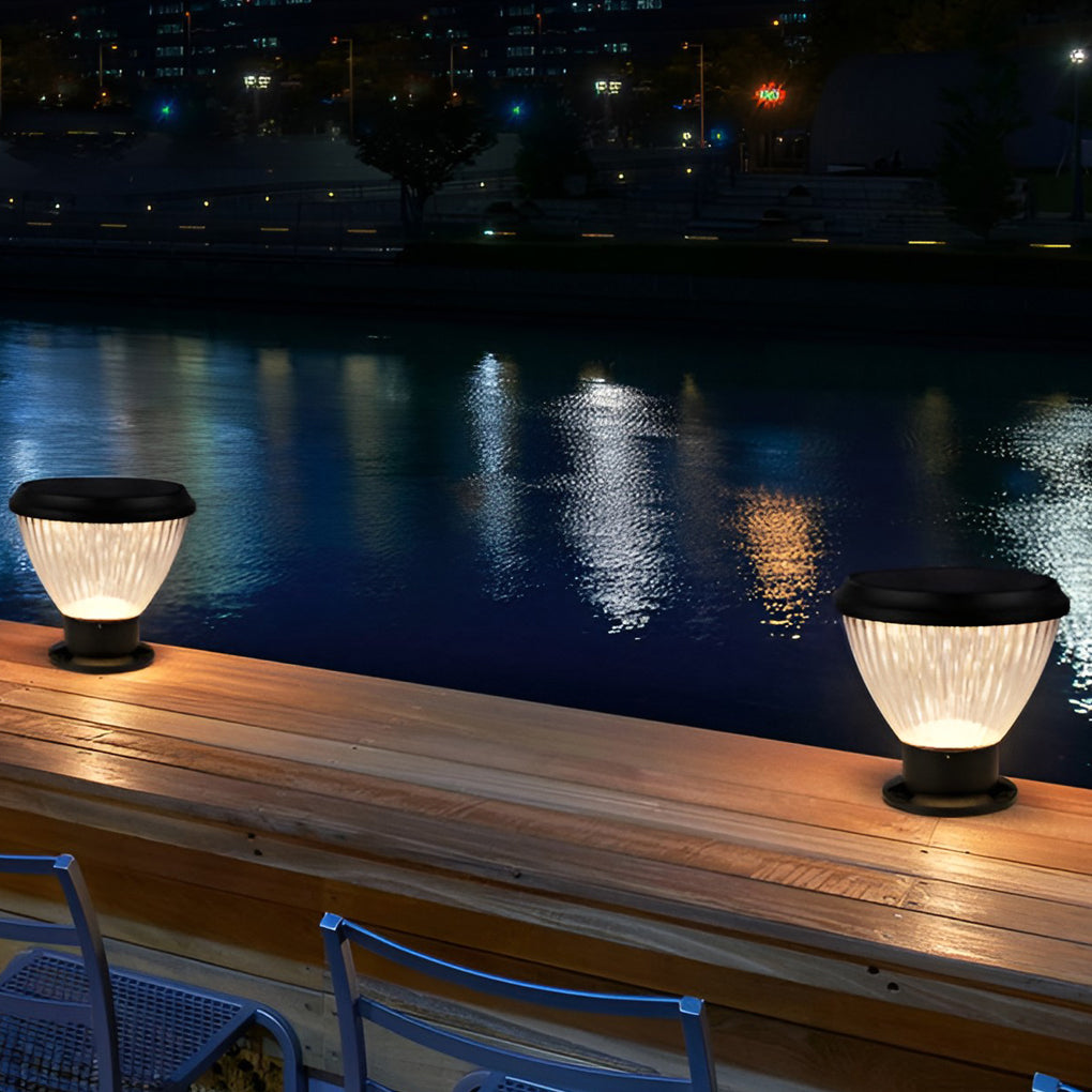 Solar light post cap enhancing a stylish outdoor seating area with ambient light.