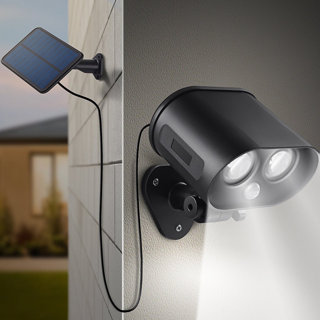 Close-up view of dual LED heads on a solar motion sensor lamp with motion detection lens.