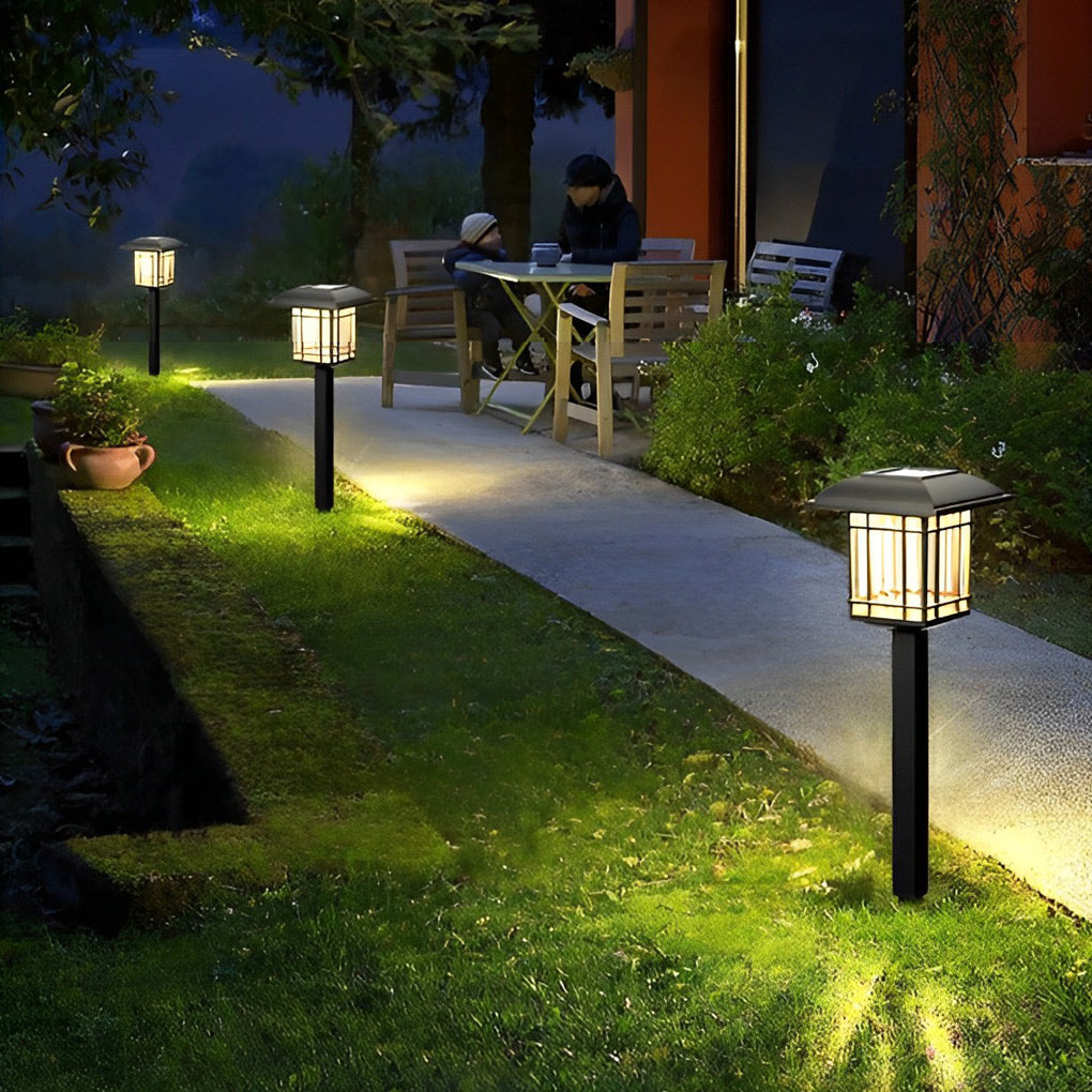 Solar outdoor lawn light with a close-up of its solar panel and durable design.