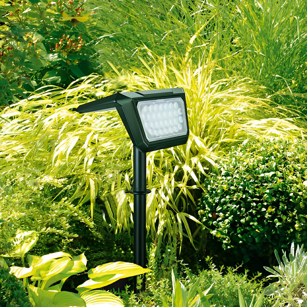 Solar path lights outdoor highlighting ornamental grass and plants, adding charm to the garden pathway.
